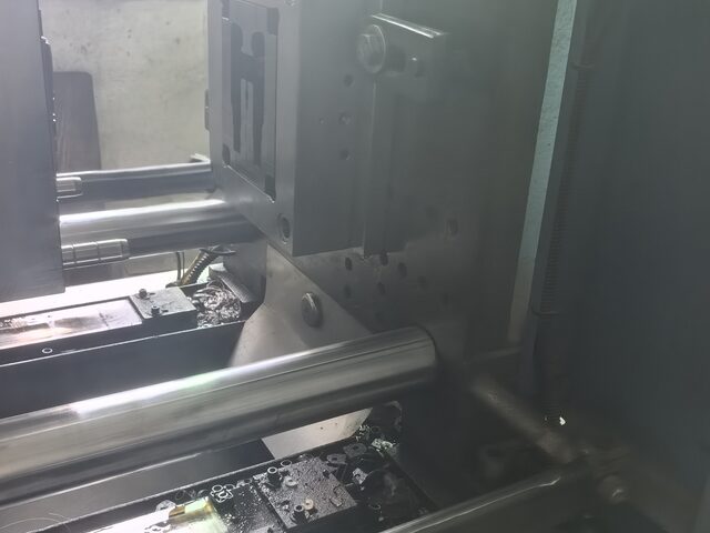 A mold mounted in the injection press