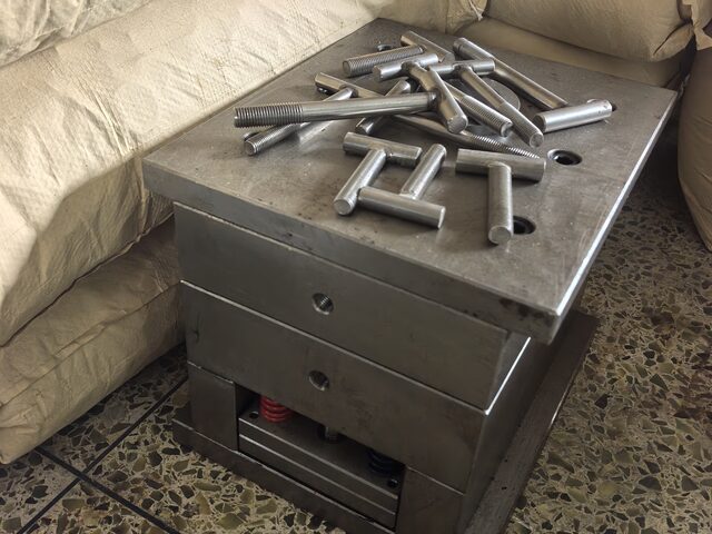 A finished mold with its ejector pins